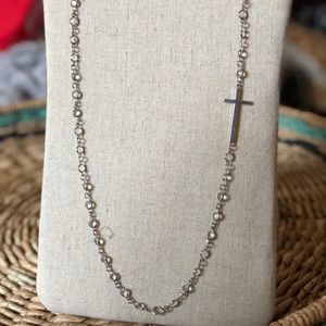 NWOT silver and crystal cross necklace 37" long